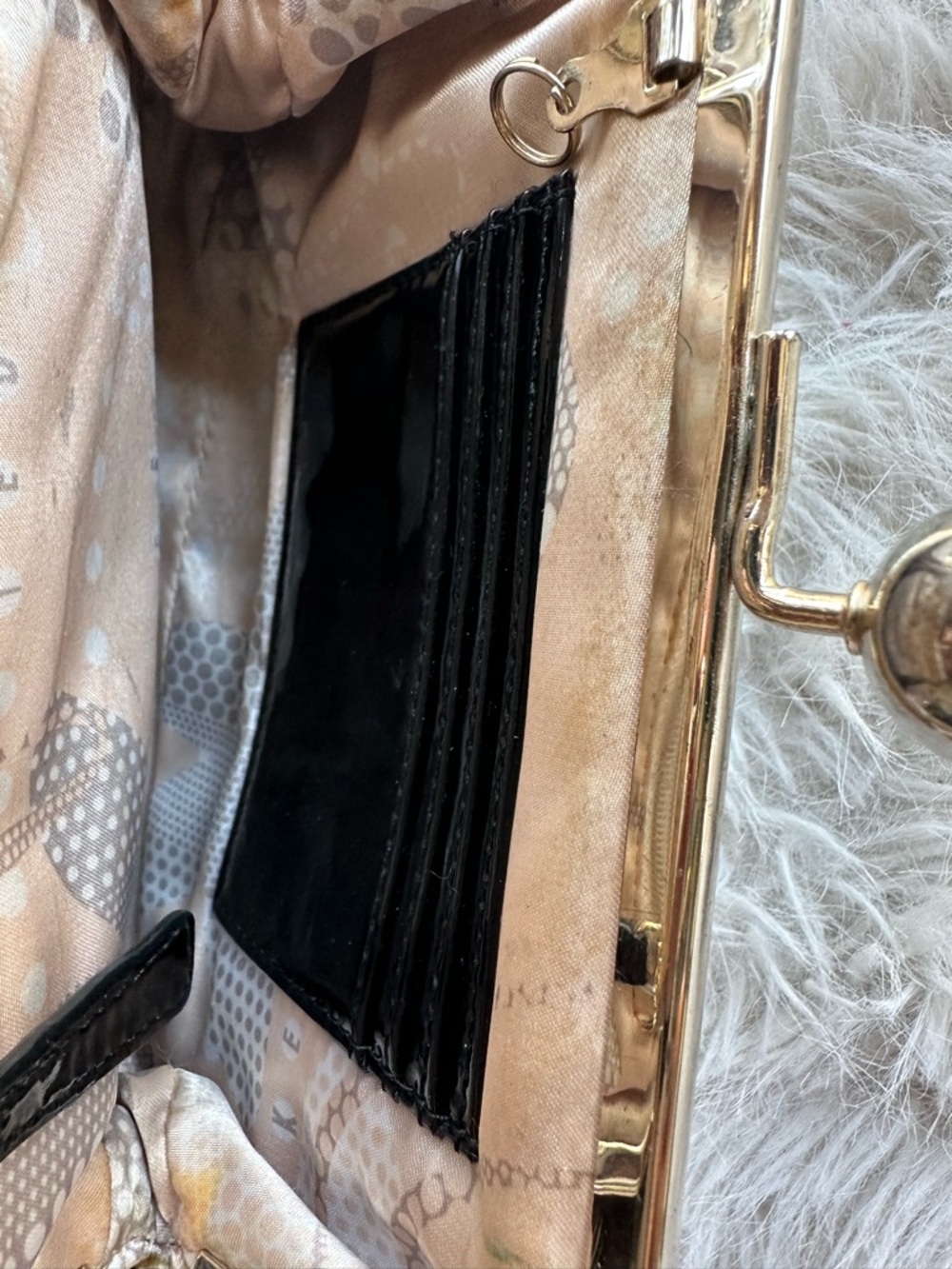 Ted Baker Black Patent Kiss-Lock Wristlet Clutch with Gold Frame - Picture 6 of 16